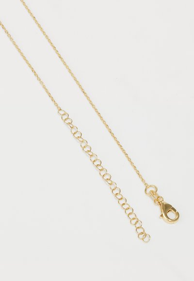 Zelta ķēdes kaklarota ar ovālām saitēm, teksturētu virsmu un omāra sprādzi. Regulējams garums ar virkni apaļu savienotāju.