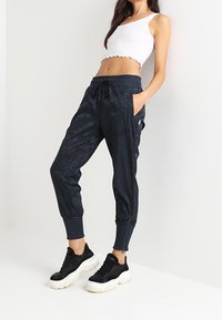 Nike Sportswear Tygbyxor - dark blue