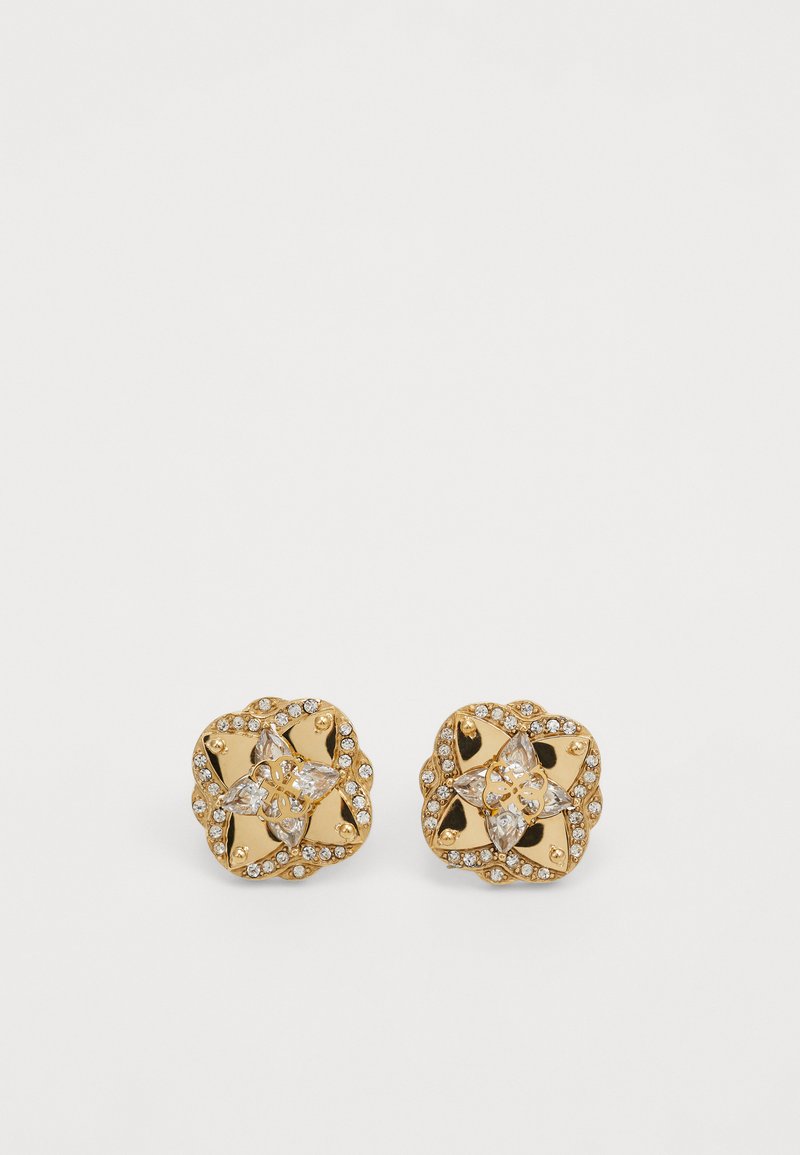 Brincos de pressão em tom dourado com um design floral, adornados com cristais transparentes e detalhes intrincados nas bordas. Forma quadrada.