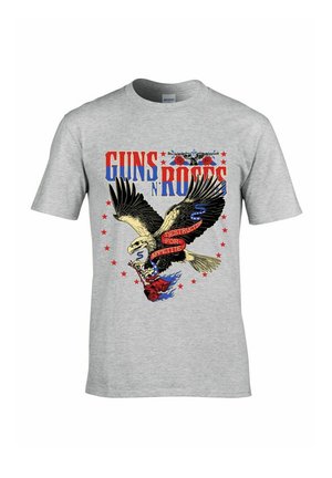 Camiseta de algodón gris con un gráfico de un águila, texto en rojo y azul que dice "GUNS N' ROSES", rosas y estrellas en colores llamativos.