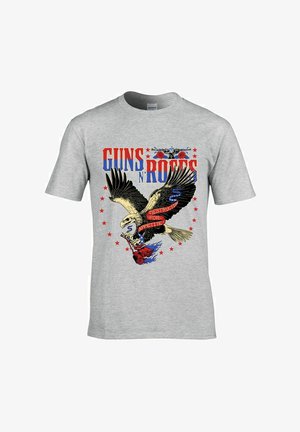 Grå bomulds t-shirt med en ørn grafik, rød og blå tekst med teksten "GUNS N' ROSES," roser og stjerner i fede farver.