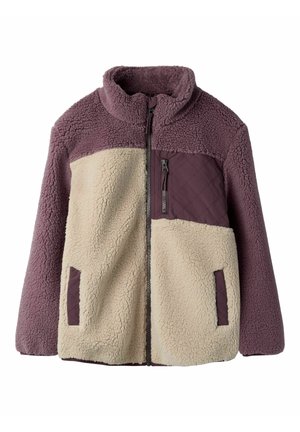 Flis jakna z barvnimi bloki slive in smetane, z zadrgo spredaj po celotni dolžini, stoječim ovratnikom, prešito prsno žepko z zadrgo in dvema stranskima žepoma.