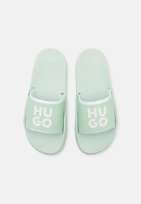 HUGO NIL SLID - Mules - light/pastel green