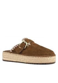 Brown suede slip-on sandal with woven jute platform, buckle accent, and braided edge detailing. Flat sole design.