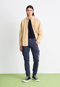 Alpha Industries PETROL PATCH - Cargo trousers - ultra navy