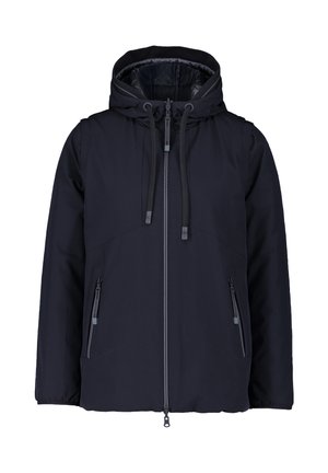 Veste à capuche noire en tissu doux et résistant à l'eau. Elle est dotée de poches zippées, de cordons de serrage ajustables et d'une doublure intérieure lisse.