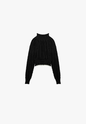 Maglione nero a trama con colletto alto, maniche arricciate e orlo corto. Tessuto morbido con una vestibilità rilassata e finitura.