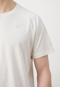 ASICS GAME  - Basic T-shirt - cream