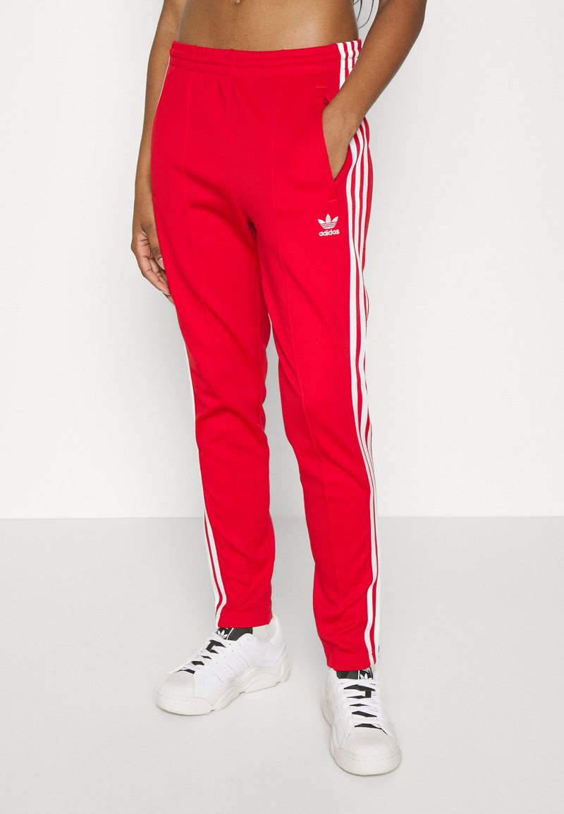 adidas Originals Spodnie treningowe/czerwony - Zalando.pl