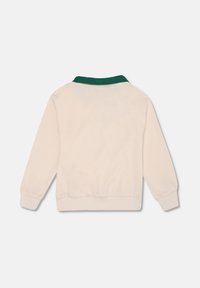 Felpa crema con colletto verde, polsini e orlo a costine. Tessuto morbido, vestibilità casual, presenta una texture liscia e un design minimalista.