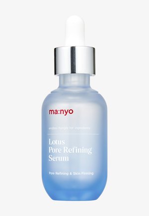 Flacon compte-gouttes bleu givré du sérum Manyo Lotus Pore Refining pour affiner les pores et raffermir la peau.
