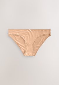 Sous-vêtements féminins style bikini beige avec un petit nœud et une bordure en dentelle le long de la ceinture et des ouvertures des jambes sur un fond clair.