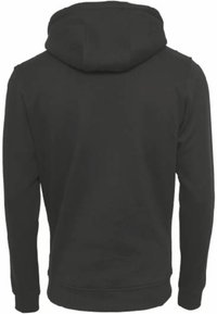 Felpa nera con cappuccio, caratterizzata da una tasca a marsupio, maniche lunghe e cordino regolabile. Il tessuto appare liscio con polsini e orlo a costine.