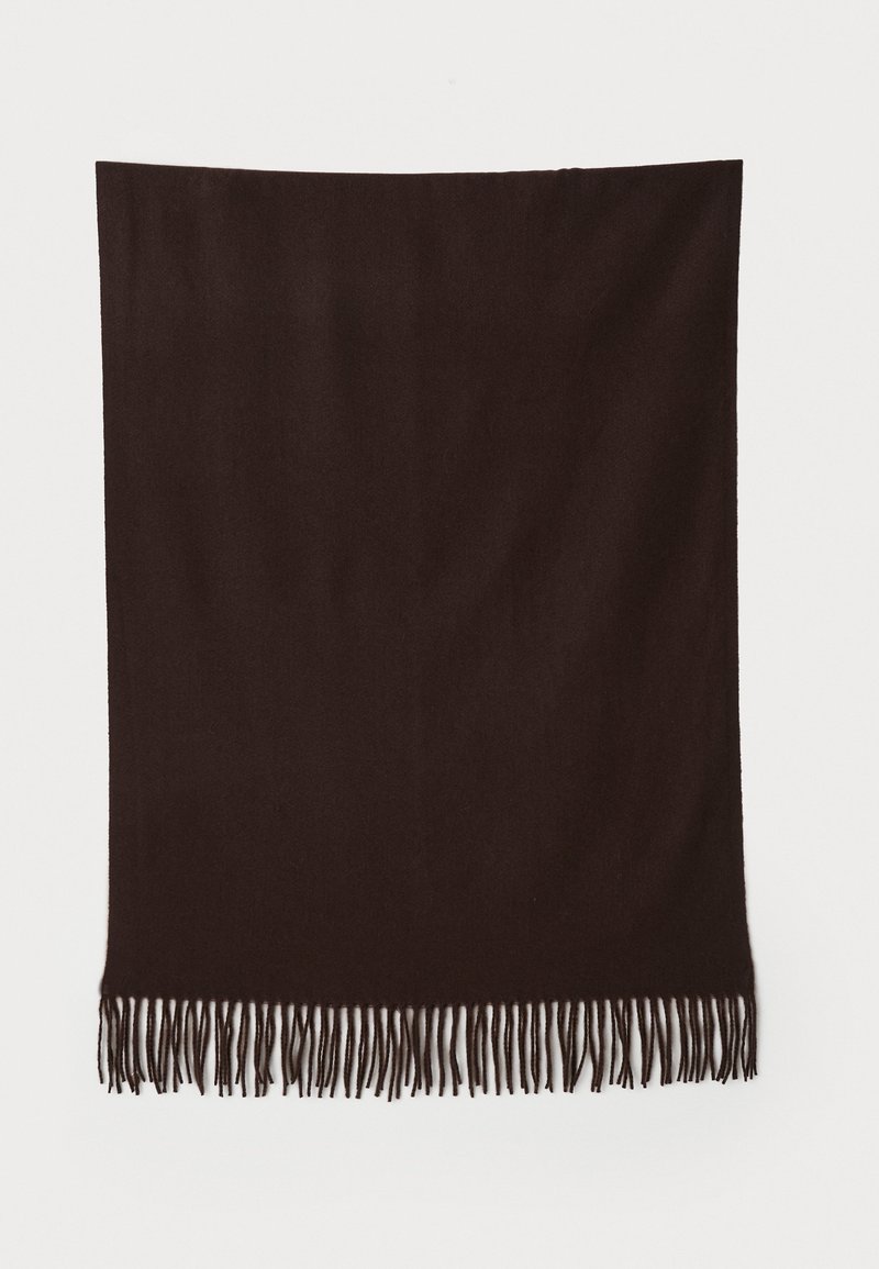 Couverture brun foncé avec des bords effilochés, présentée à plat sur un fond blanc, mettant en valeur sa texture et sa simplicité.