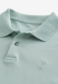 Next Polo - blue ice