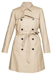 Beige trench coat s dvouřadým zapínáním, černými knoflíky, dlouhými rukávy a uvázaným páskem. Vyroben z hladké, lehké látky.
