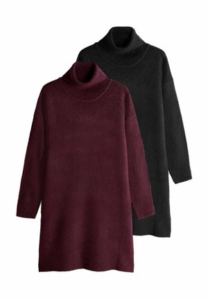 Två polotröjor: en i djupt vinröd och en i svart. Båda har ett mjukt, texturerat stickat material och långa ärmar med ribbstickade muddar.