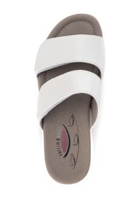 Witte slidesandalen met twee brede leren banden en een zachte, bruine inlegzool. Heeft een subtiele logo en een gevoerde zool.