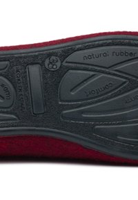 Red felt slipper with a black natural rubber sole. Features textured grip pattern and printed size detail, indicating size 38.