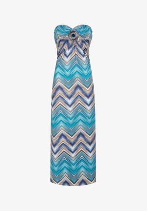 Sukienka maxi bez ramiączek z wzorem w zygzaki w kolorze turkusowym, niebieskim i brązowym. Posiada marszczenie w okolicy biustu oraz dekoracyjny okrągły akcent.