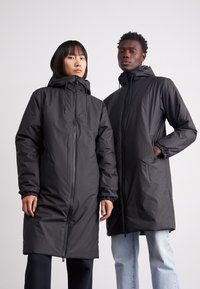 Rains LOHJA LONGER INSULATED JACKET UNISEX - Ziemas mētelis - black