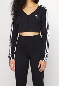 adidas Originals Tunn jacka - black