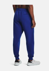 Under Armour RIVAL FLEECE - Spodnji deli trenirk - royal