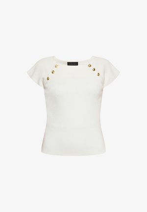 Witte ribbel top met korte cap mouwen, voorzien van gouden knoopdetails op de schouders. Gemaakt van een gestructureerde breisel stof.