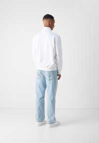 Tommy Hilfiger ESSENTIAL ZIP UNISEX - Sweater - white
