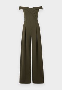 Tuta verde oliva con design scollato, gambe ampie plissettate e corpino aderente. Realizzata in un tessuto liscio e strutturato.