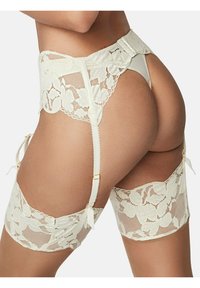 Witte kanten kousenband met bloemmotief en verstelbare banden. Beschikt over een brede tailleband en hardware-accenten. Zachte, semi-transparante textuur.