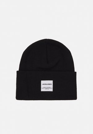 Black knitted beanie hat with a cuff, featuring a white label with "JACK & JONES" and care instructions. Soft texture and smooth finish.