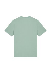 T-shirt vert menthe à manches courtes, col rond, fabriqué dans un tissu doux, avec une texture lisse. Design simple et sans ornements, sans logos ni motifs visibles.