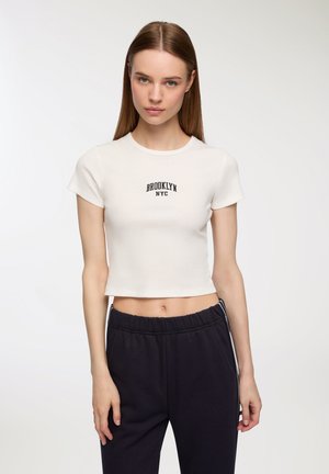 T-shirt con stampa - bianco lana