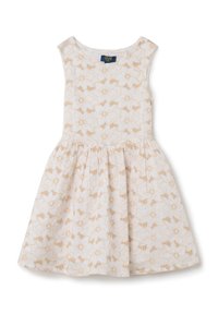 Vestido sin mangas de algodón blanco con un patrón floral en beige claro, diseño de falda acampanada, escote redondo y etiqueta de la marca OVS.