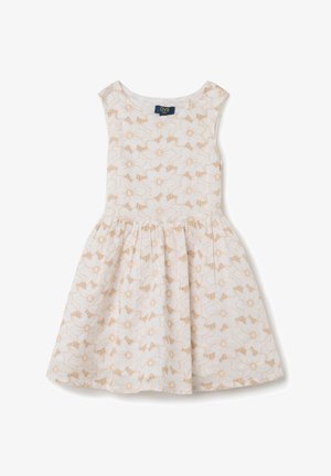 Vestido sin mangas de algodón blanco con un patrón floral en beige claro, diseño de falda acampanada, escote redondo y etiqueta de la marca OVS.