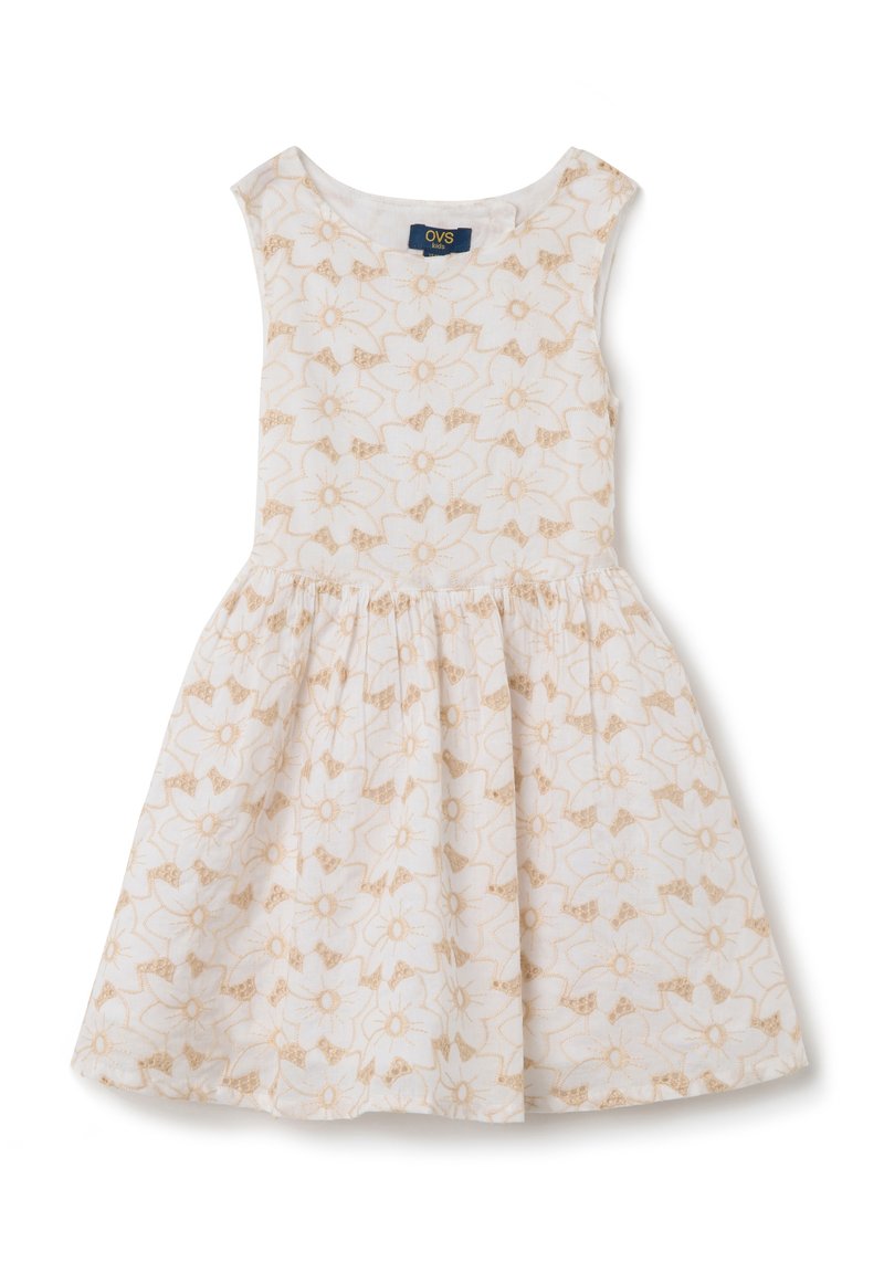 Vestido sin mangas de algodón blanco con un patrón floral en beige claro, diseño de falda acampanada, escote redondo y etiqueta de la marca OVS.