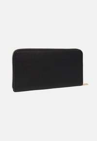 Black leather wallet with a textured finish, zip closure, and gold-tone hardware. Features a long rectangular shape and minimalistic design.
