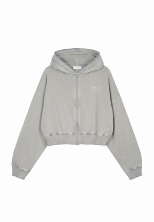 Felpa grigia accorciata con zip frontale, design oversize, orlo e polsini a coste, con un piccolo logo sul petto.
