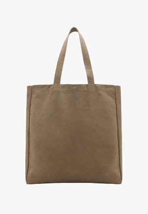 Sac fourre-tout en toile de couleur beige, doté de deux poignées robustes. Forme rectangulaire avec une texture lisse et sans embellissements visibles.