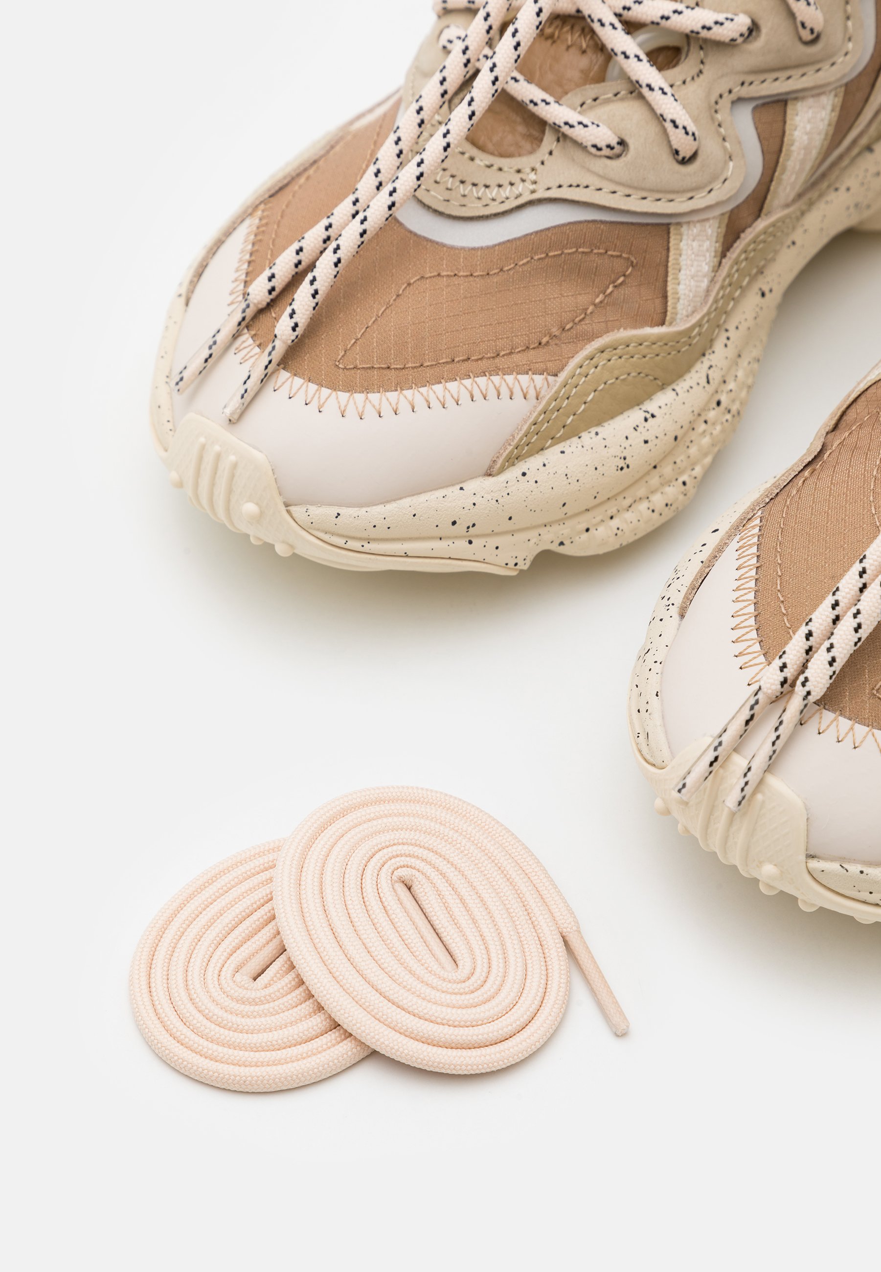 brown ozweego trainers