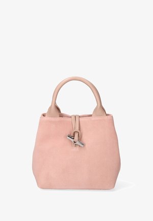 Kleine rosa Wildleder-Handtasche mit hellbeigen, runden Griffen und einem silbernen Toggle-Verschluss in der Mitte vorne.