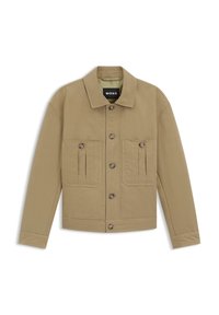 Brūns kokvilnas žakete ar apkakli, gariem piedurknēm un divām priekšējām kabatām ar pogu aizdari. Iekšpusē redzama zīmola etiķete.