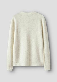 Kreminės spalvos raištinė megztinis su ilgomis rankovėmis, rodomas iš nugaros ant šviesiai pilko fono.