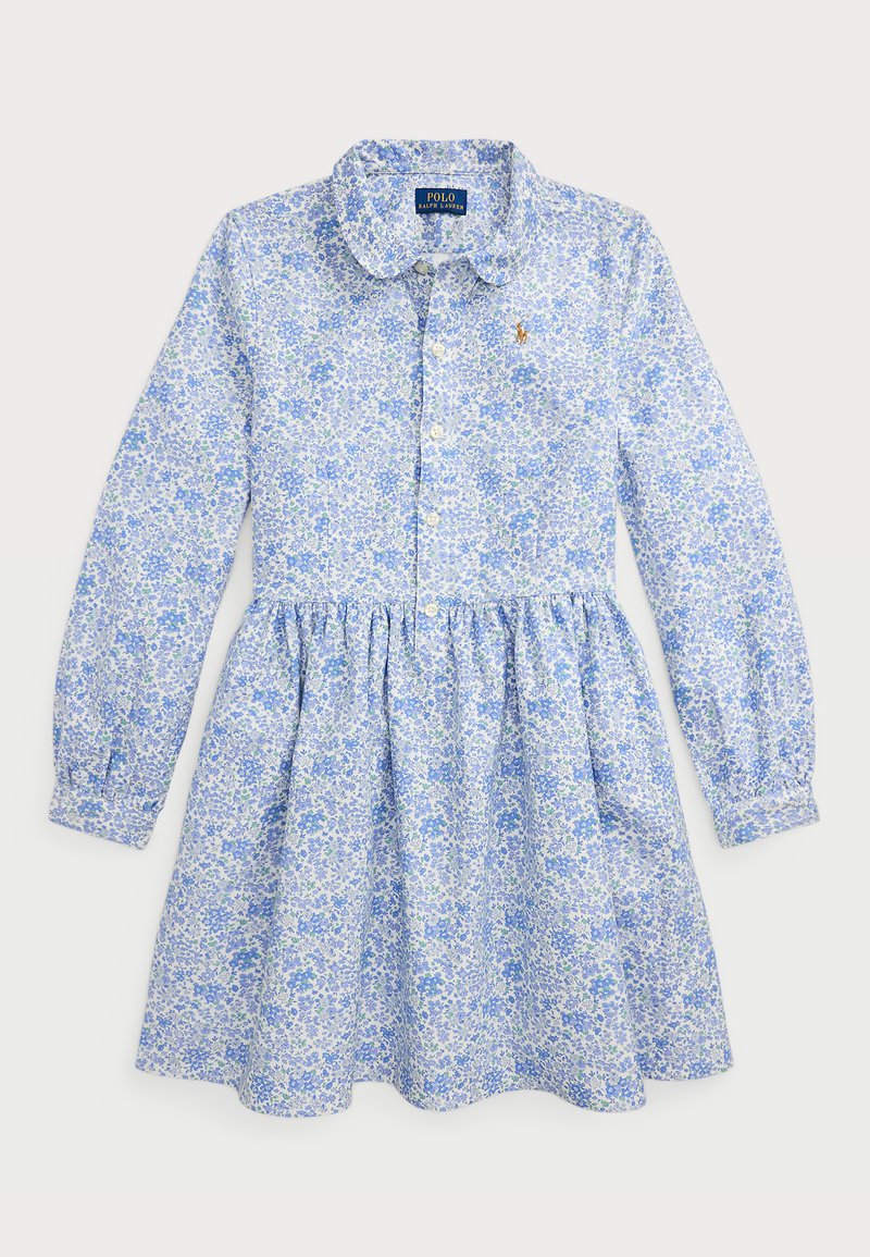Vestido floral azul con cuello, delante abotonado y cintura fruncida. Mangas largas con puños abotonados. Sutiles acentos verdes en el patrón.
