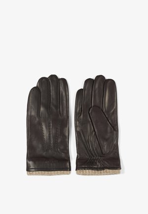 Guantes de cuero marrón oscuro con un puño de punto beige acanalado. Las características incluyen detalles cosidos en la parte posterior y un acabado suave.