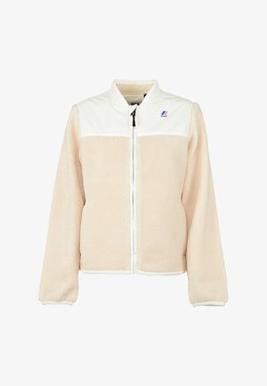 Giacca in pile beige con sovrapposizione in nylon bianco, chiusura con zip frontale e collo alto. Presenta un logo sul lato sinistro superiore del petto e polsini elasticizzati.
