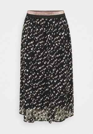 Black midi skirt with sheer fabric, scattered white and beige star patterns, and a glittery rose gold elastic waistband.