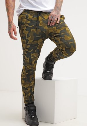 Pantalones deportivos - olive