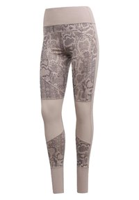 Legíny s vysokým pasem s béžovými a tlumenými hadími potiskovými panely, s vložkami z látky z síťoviny na stehnech a spodních částech nohou.